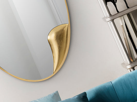 Espejo Ovalado Daisy 120x70 cm Acabado Pan de Oro Schuller en ambiente decorado | Schuller