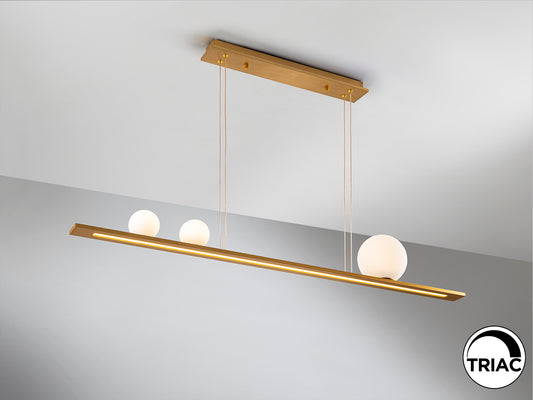 Lámpara Colgante Lineal LED Mila 120 cm Dorada Schuller en ambiente decorado | Schuller