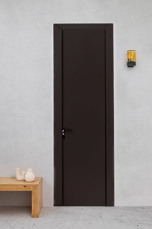 Aplique KILA fabricado en aluminio color gris oscuro con difusor ámbar