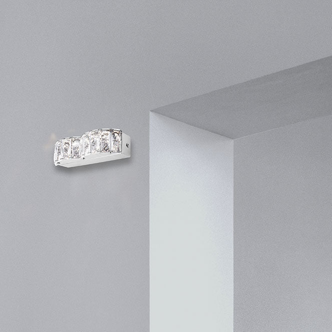 Aplique LED ZURIQUE 8W 4000K Cromo Interlusa instalada en ambiente decorativo de salón o dormitorio | Interlusa