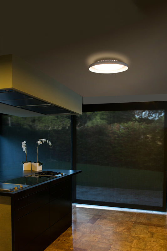 Imagen ambiente de Plafon LED DOLME Blanco 3000K de FARO modelo 64097, luminaria de superficie minimalista en acero y PMMA para iluminación interior del hogar cálida LED 3000K, colección 6409