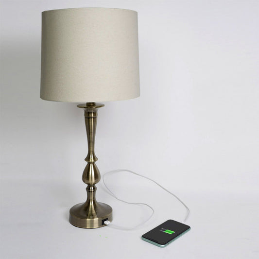 Lámpara de sobremesa Khalifa de Abrila en cuero y metal, diseño moderno de 60.5x28x28 cm con puerto USB, ideal para decoración interior doméstica y textil.