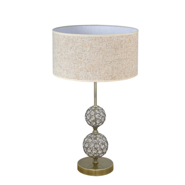 Lámpara de sobremesa Beatia en cuero beige por Abrila, diseño clásico con metal, cristal y textil para decoración interior e iluminación doméstica difusa, casquillo E27.