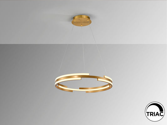 Lámpara colgante Ciclos oro D60 de Schuller en salón moderno, diseño con LED regulable y altura ajustable.