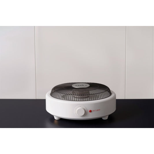 Brasero Eléctrico Perry 900 W Blanco/Negro Fabrilamp instalada en ambiente decorativo de salón o dormitorio | Fabrilamp / Abrila