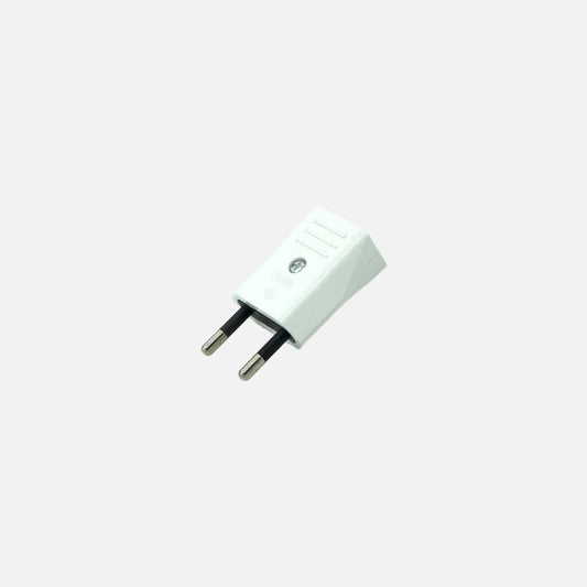 Clavija Retráctil Eco Mod5 2P+T 10A 230V Blanca Fabrilamp instalada en ambiente decorativo de salón o dormitorio | Fabrilamp / Abrila