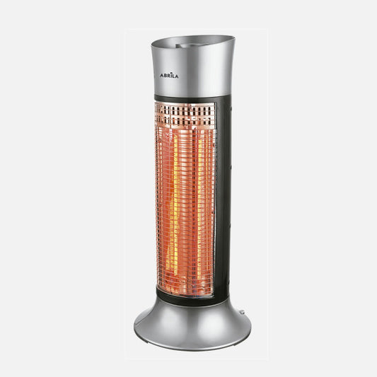 Estufa Eléctrica de Carbono Yuma 900 W Oscilante Plata/Negro Fabrilamp instalada en ambiente decorativo de salón o dormitorio | Fabrilamp / Abrila
