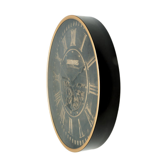 Reloj Trieste fabricado en metal color negro y oro