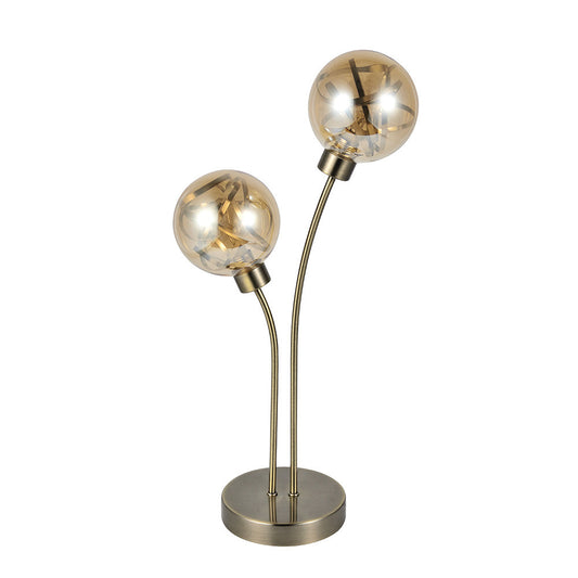 Sobremesa Varanasi fabricada en metal color cuero y cristal ámbar, elegante y cálida