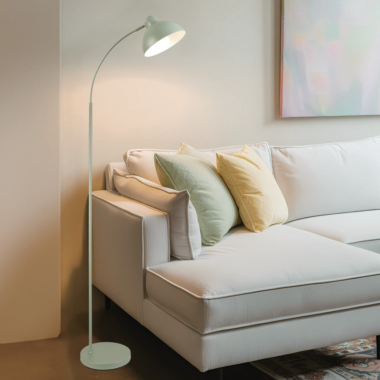 Pie de salón Niu verde en ambiente de salón moderno