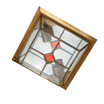 Plafón Granadino fabricado en metal color cuero y rojo para interiores