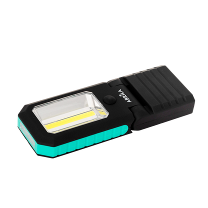 Vista lateral de la Linterna RUMBO LED COB de Fabrilamp mostrando su diseño compacto y articulable
