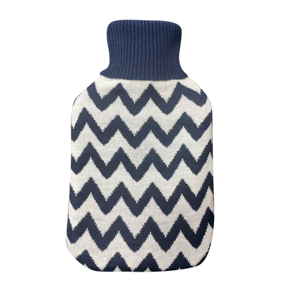 Suave bolsa de agua caliente con borlones, ideal para calentar la cama.