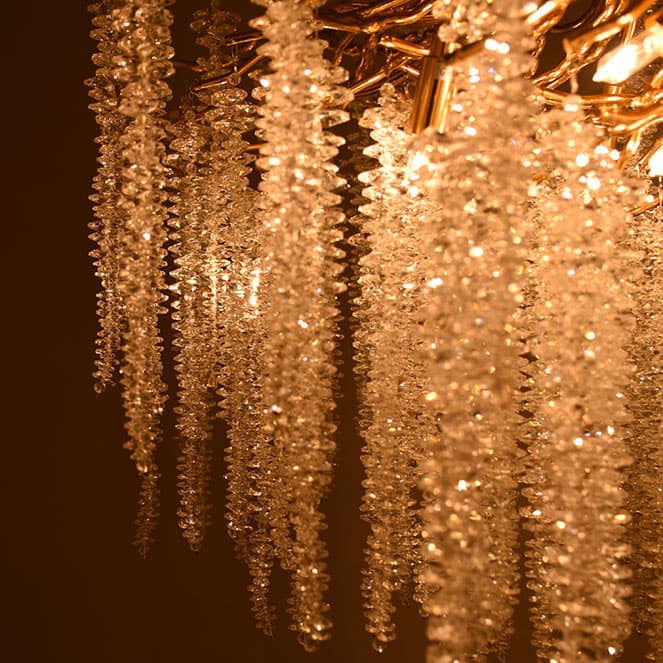 CHAMONIX fabricada en metal color oro y cristal transparente