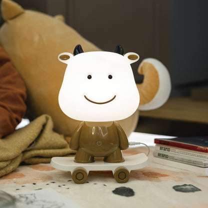 Sobremesa Maskota Vaca Marrón instalada en habitación infantil - Ambiente decorado