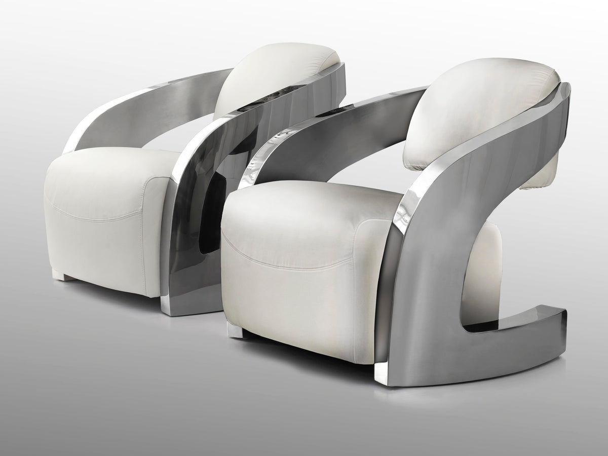 Sillón Tapizado Amanda Piel Italiana Blanca Acero Pulido Schuller en ambiente decorado | Schuller