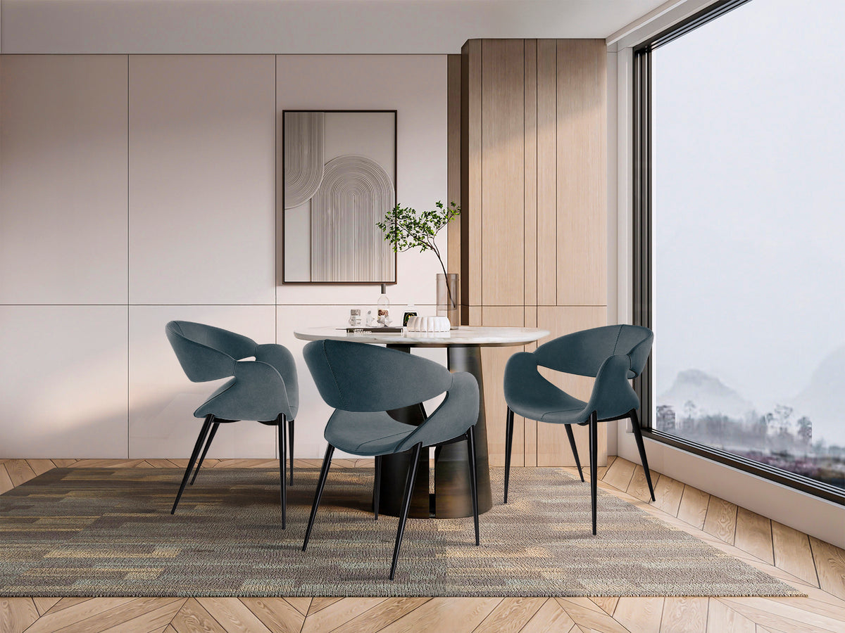 Sillón Giro Azul Oscuro con Patas Negras Mate Schuller en ambiente decorado | Schuller
