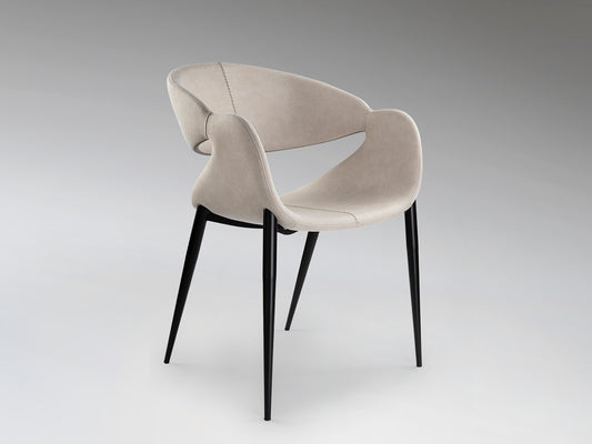 Sillón Giro Tapizado Piedra con Patas Negras Schuller en ambiente decorado | Schuller