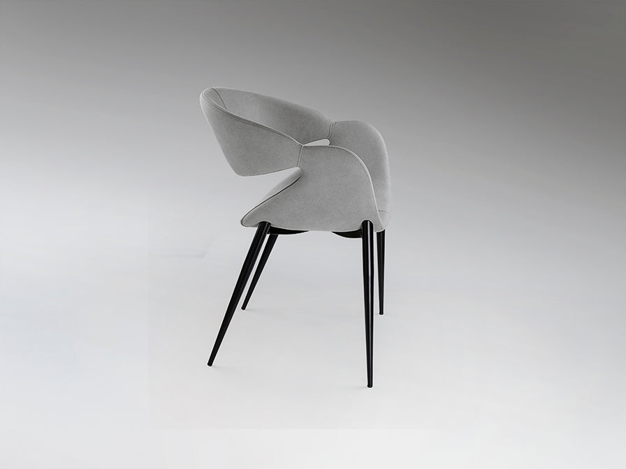Lateral de Sillón de Comedor de diseño Giro de Schuller (Giro) tapizado en Gris Claro con patas negras - Ref 629140.

