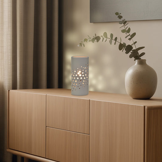 Sobremesa cerámica LAVA topo en ambiente de dormitorio moderno