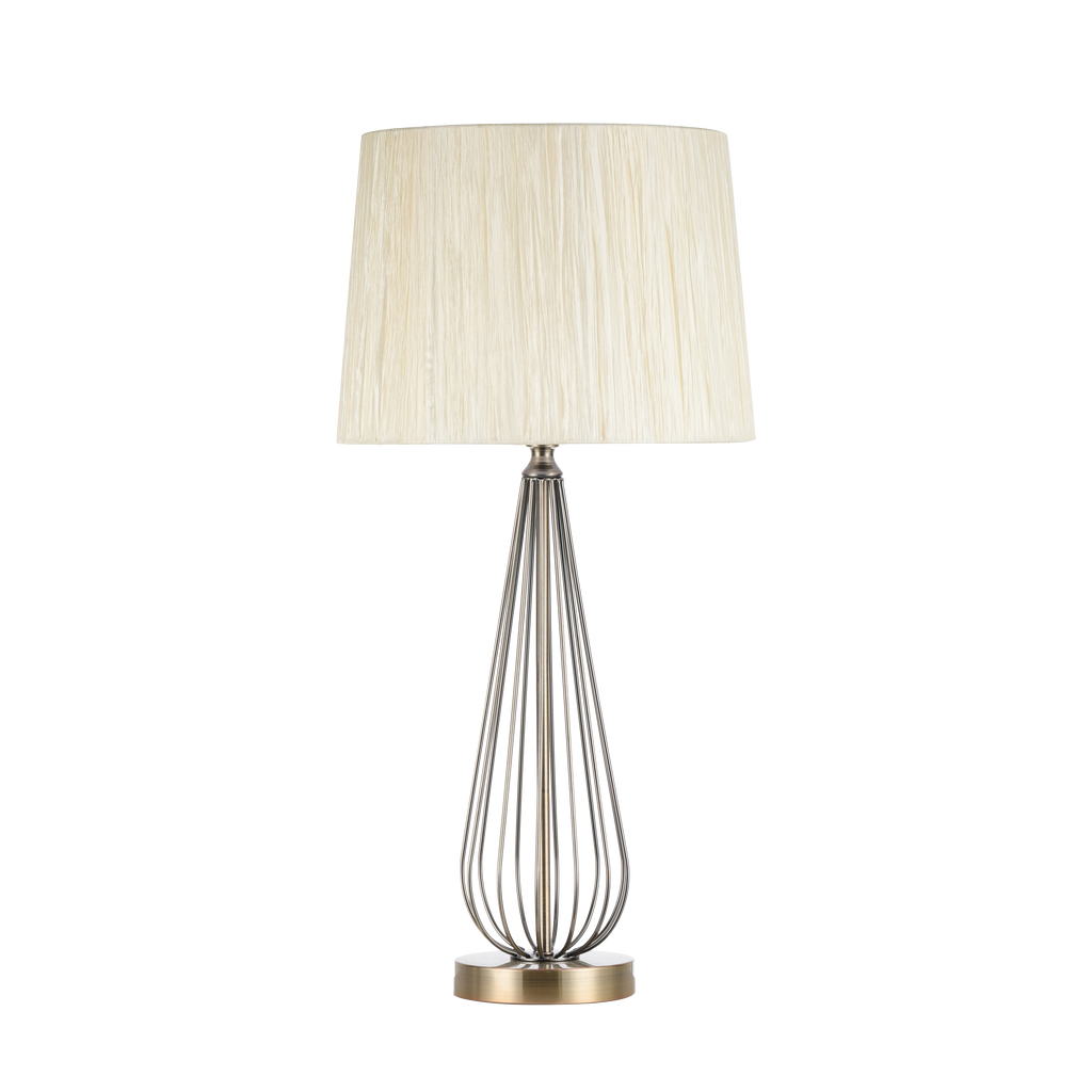 Sobremesa Robina fabricada en metal color cuero con pantalla textil beis, iluminación acogedora