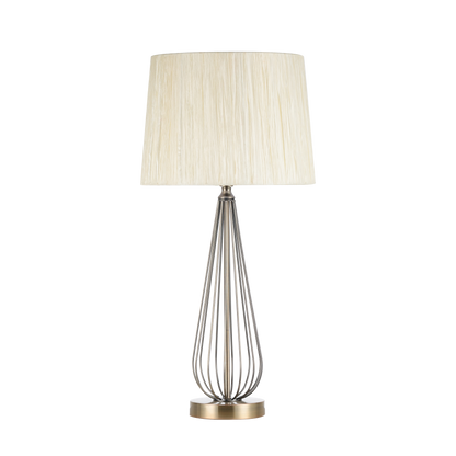 Sobremesa Robina fabricada en metal color cuero con pantalla textil beis, iluminación acogedora