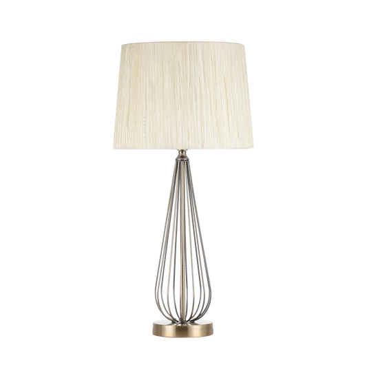 Sobremesa Robina fabricada en metal color cuero con pantalla textil beis, iluminación acogedora