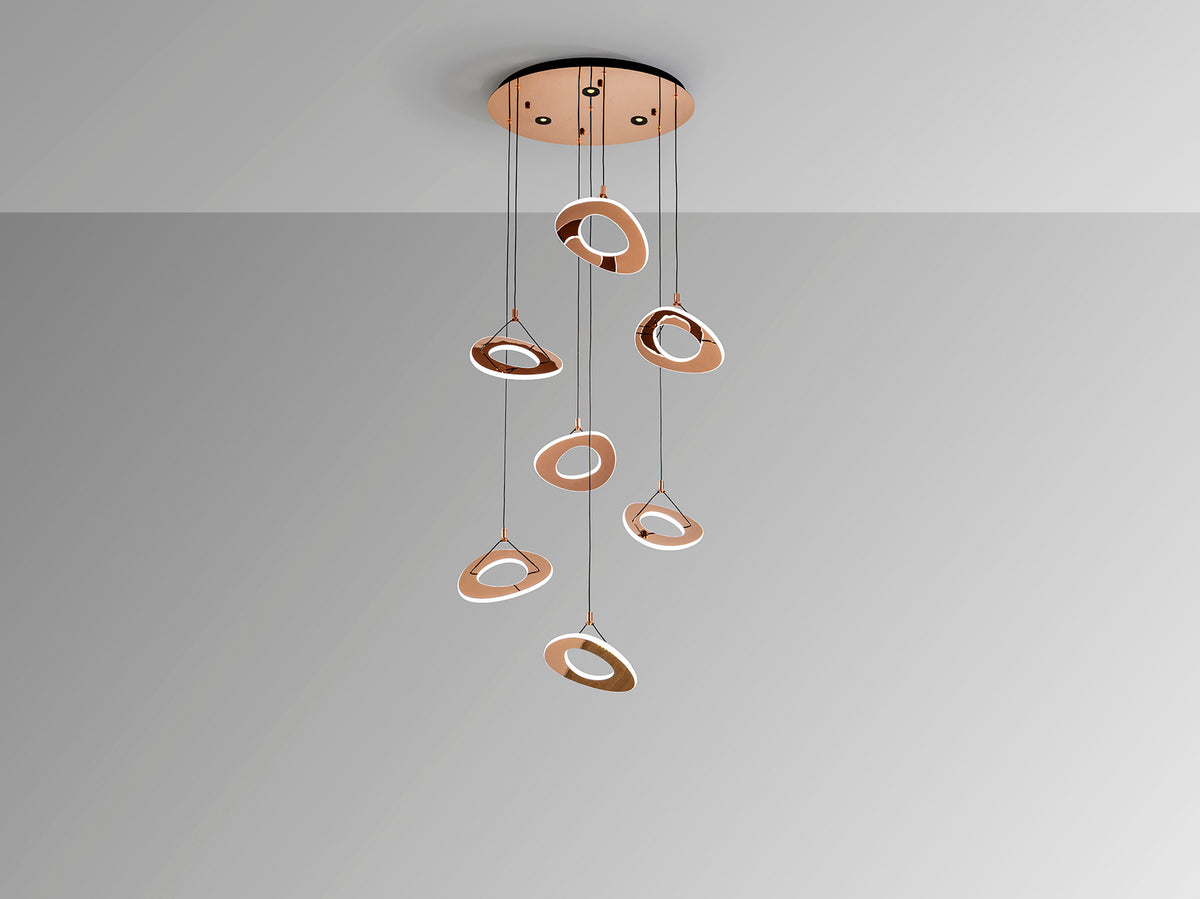 Lámpara Colgante LED Mirena 7 Luces Oro Rosa Schuller en ambiente decorado | Schuller