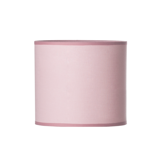 Lámpara Ibor fabricada en metal color blanco y textil rosa para luz suave