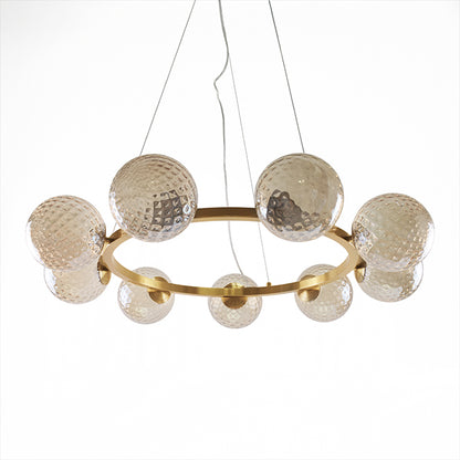 Lámpara ANDREZA fabricada en Metal color Bronce con esferas de Vidrio Ámbar
