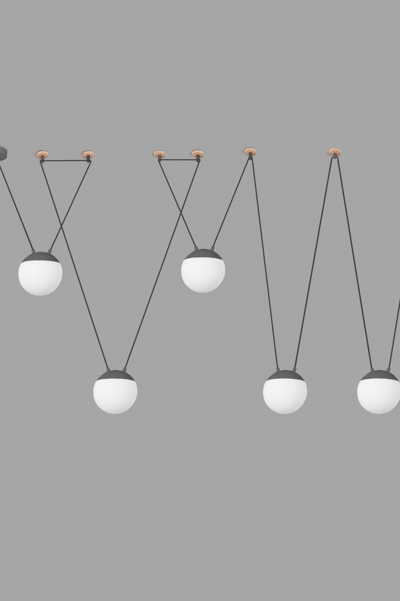 Lámpara colgante MINE SPACE 5L en gris oscuro de FARO, instalada en ambiente interior residencial moderno, con estructura de aluminio y cristal opal para iluminación LED eficiente en espacios comerciales.