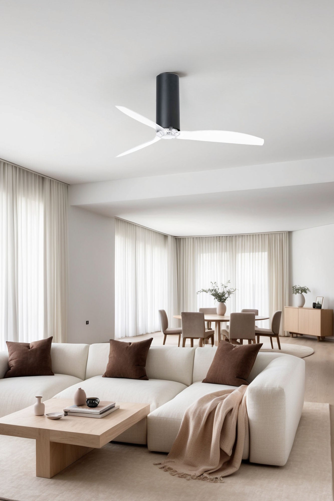 Imagen ambiente de ventilador de techo TUBE FAN M WIZ en negro mate de FARO (32036WW), instalado en habitación hogareña con aspas transparentes, motor DC silencioso de 6 velocidades para ventilación eficiente sin luz.