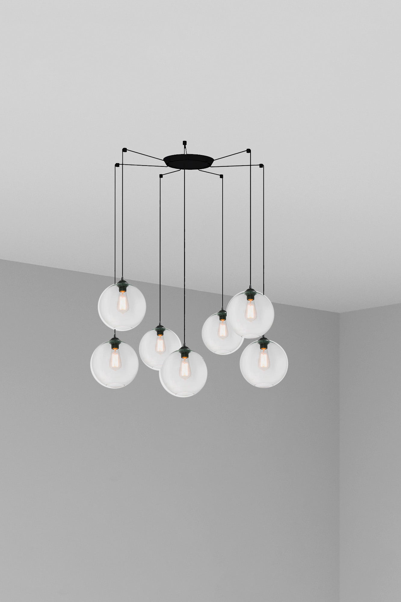 Lámpara colgante CLARA 7L transparente de FARO 64128-7L, diseño en cristal y acero negro mate para iluminación interior residencial y restaurantes