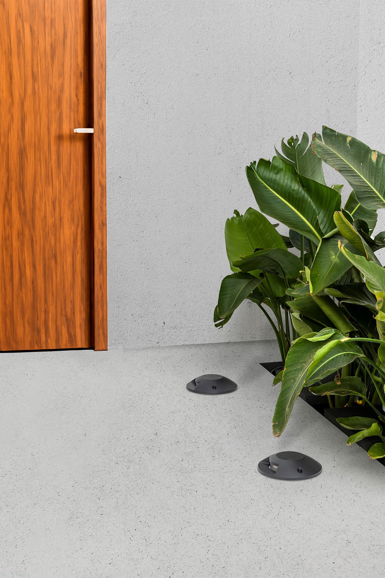 Lámpara de superficie LOTH 1L negro mate en aluminio LED para exterior, instalada en pared ambiente, modelo FARO 70285 serie 7036, luminaria IP67 para señalización y FARO exterior