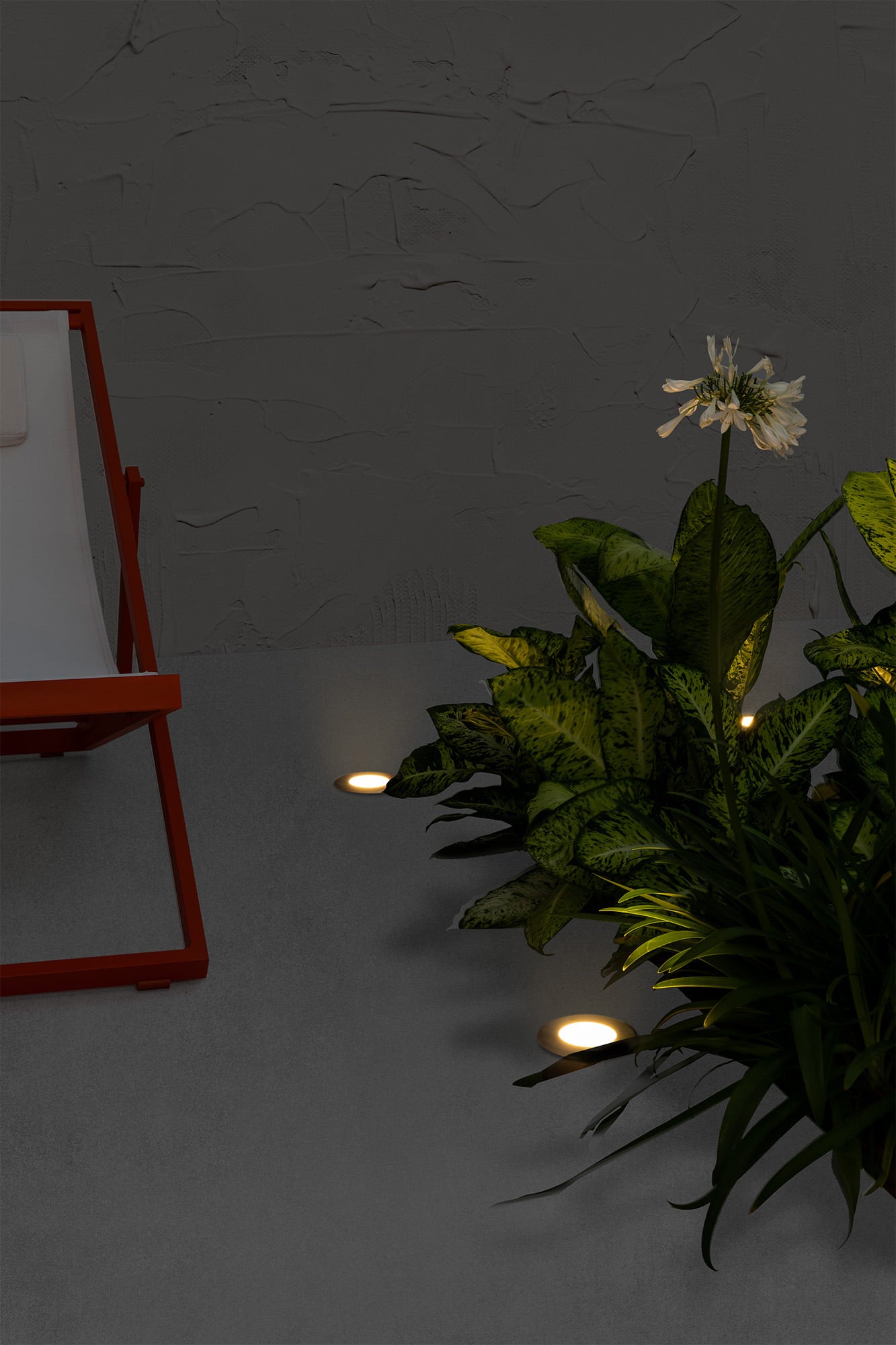 Luminaria LED Empotrable 18R Inox FARO 71498N en ambiente de jardín exterior, acero inoxidable resistente IP67 IK08, Colección 1486 para iluminación sostenible