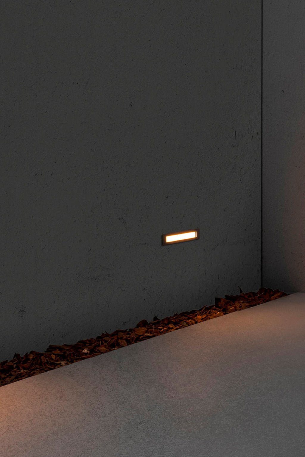 Faro empotrable LED FALLS 290 6W 2700K acero inoxidable IP67 en ambiente de jardín o terraza, luminaria exterior para iluminación cálida en paisajes.