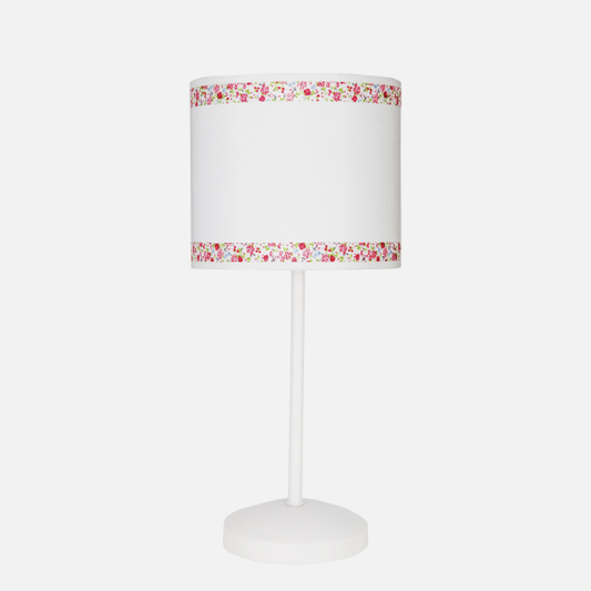 Lámpara sobremesa Cenefa de Abrila en blanco y rosa, diseño infantil con base de metal textil y cenefa decorativa, bombilla E14, ideal para iluminación infantil en interiores (modelo 107371000).