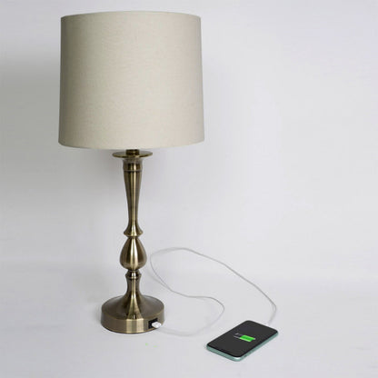 Lámpara de sobremesa Khalifa de Abrila en cuero y metal, diseño moderno de 60.5x28x28 cm con puerto USB, ideal para decoración interior doméstica y textil.