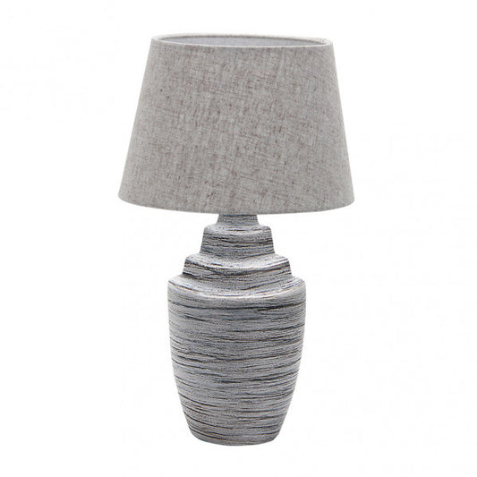 Lámpara de sobremesa cerámica Tui en zinc gris por Abrila, modelo 160371028, con casquillo E27 para luz difusa en decoración interior doméstica.