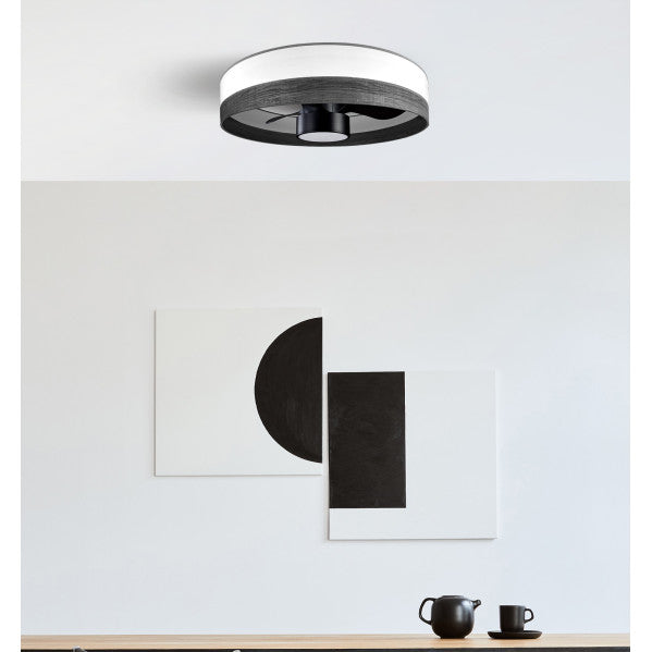 `alt=Ventilador de techo DC 24W Olga en blanco madera y negro con LED y mando a distancia por Abrila, modelo 190091709`

---

Recuerda que este texto debe ser descriptivo, breve y relevante.