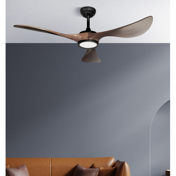 Ventilador de techo Viana 18W Negro/Roble, modelo Abrila, diseñado para interiores domésticos. Este ventilador de techo presenta un motor DC eficiente, proporcionando una circulación de aire suave y silenciosa. Sus materiales en metal y madera ofrecen un acabado distinguido en tono Negro/Roble. Incluye iluminación LED integrada, añadiendo funcionalidad y estilo. Ideal para crear un ambiente confortable en salas de estar, dormitorios o espacios de negocio. Su diseño moderno y su bajo consumo energético de 18