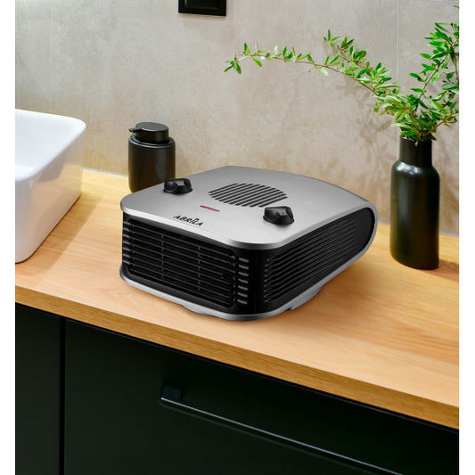 Termoventilador Ardor 2000W de Abrila en color plata y negro, modelo portátil con calefacción doméstica para interiores, fabricado en metal y policarbonato resistente, ideal para calentar espacios con 2000W de potencia.