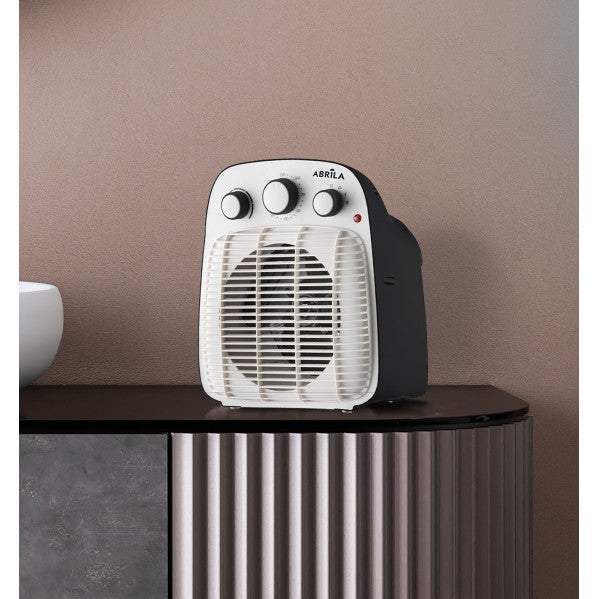 Termoventilador Lesoto 2000W blanco y negro de Abrila, calefactor portátil doméstico con protección antivuelco y carcasa de policarbonato resistente, modelo AI2 ideal para calefacción eficiente en el hogar.