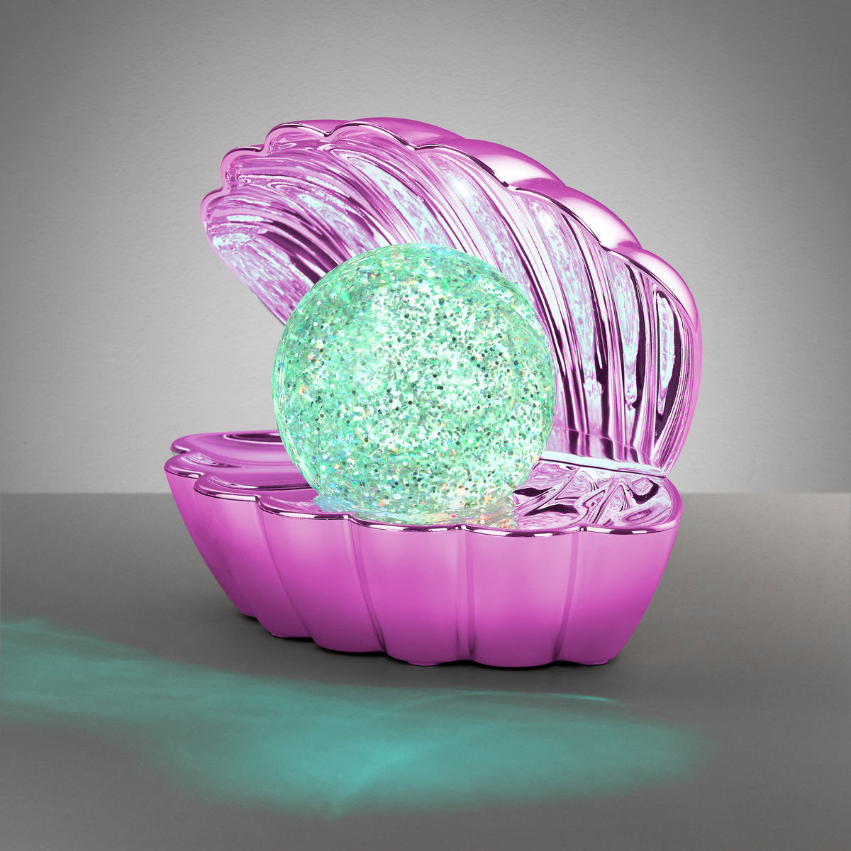 Lámpara de Sobremesa Infantil Shelly Concha RGB Rosa Trio Lighting con la perla en luz verde | Trio Lighting