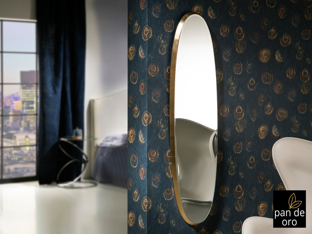 Espejo ovalado Aries dorado con marco DM y pan de oro de Schuller, ideal para dormitorio o salón. Diseño decorativo con luna biselada.