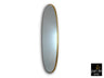 Espejo ovalado Aries pan de oro de Schuller en dormitorio o salón, con marco DM dorado y luna biselada. Espejo decorativo de la colección Aries.