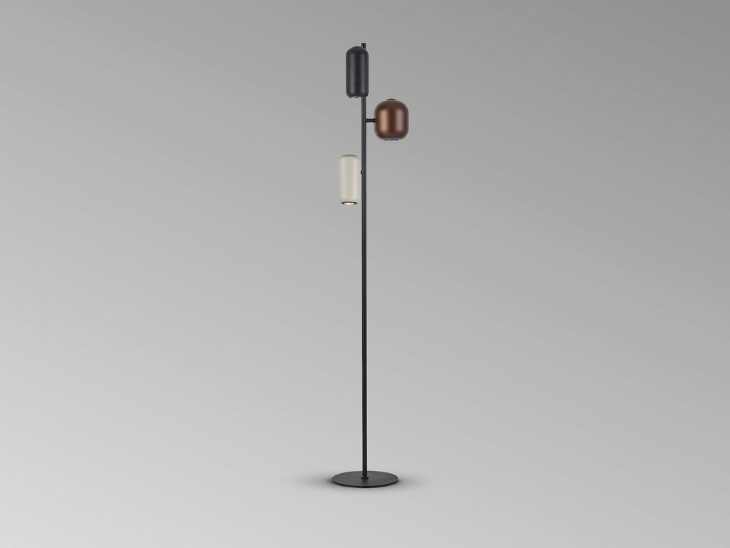 Lámpara de pie I3-Nimes Schuller en negro, marrón y gris, diseño moderno con detalles metálicos. Iluminación interior multicolor ideal para cualquier espacio.