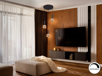 Lámpara colgante Sincro negro y oro de Schuller (175470) en salón moderno, con LED dimable, acrílico y metal, ideal para comedor.