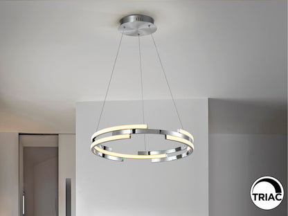 Lámpara colgante Ciclos cromada de diseño moderno con LED regulable y altura ajustable, ideal para comedor o salón. Fabricada en metal y aluminio por Schuller.