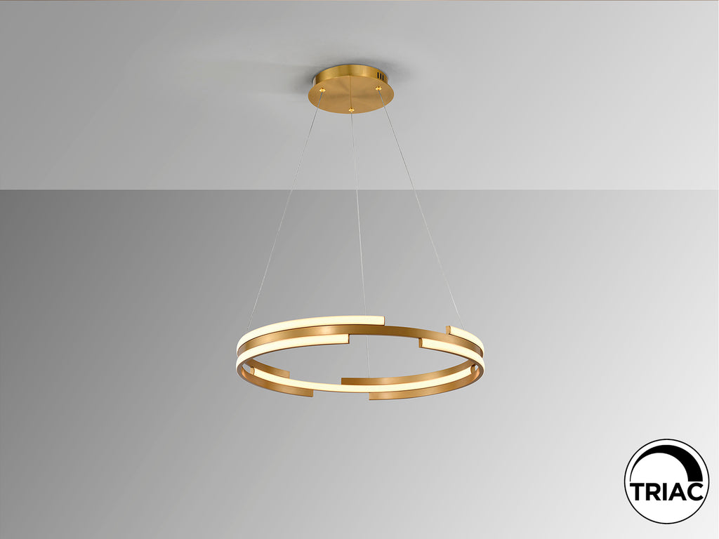 Lámpara colgante Ciclos oro D60 de Schuller en salón moderno, diseño con LED regulable y altura ajustable.